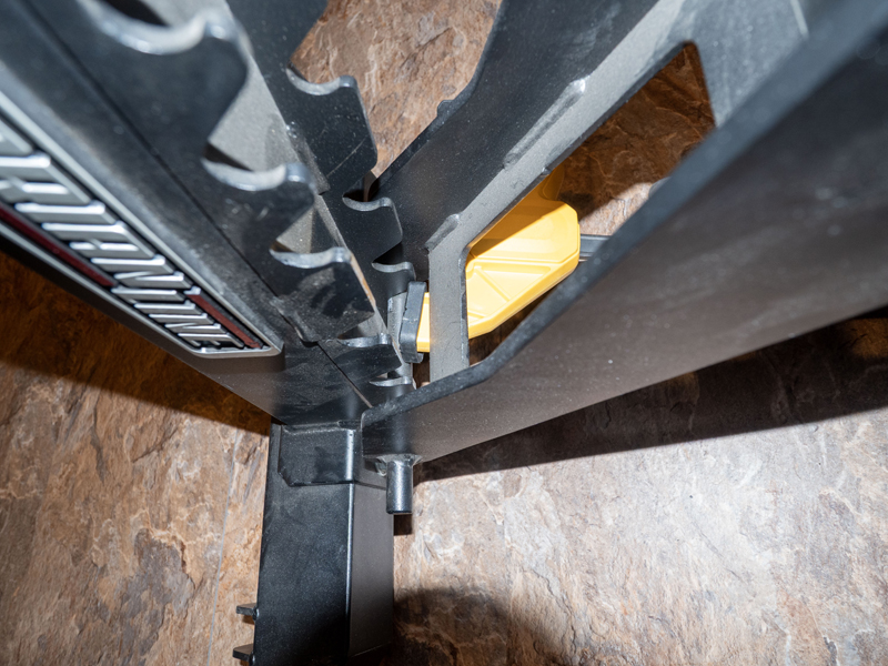 Heavy duty flat to incline Barbarian Line weight bench trigger clamped for vertical storage. Picture four.